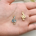 Gouden en blauwe muzieksleutel hangers met kristal in de hand voor DIY sieraden - Muzieknoot met Strass (11050) / 1 Stuk (9x21mm) / Lichtgroen