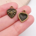 Antique bronze heart pendants with embossed scroll pattern for DIY jewelry crafts - Woven Border Heart Charm (19947)