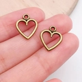 Pair of antique bronze hollow heart pendants with integrated hanging loops for DIY jewelry - Simple Hollow Heart Charm (19948)