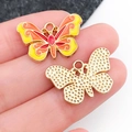 Golden butterfly alloy pendant with yellow and orange enamel and textured honeycomb back - Yellow and Orange Enamel Butterfly Wing (19091)