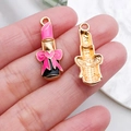 Lipstick shaped enamel pendant with pink bow detail and gold metal base for DIY jewelry - Pink Bowknot Lipstick