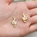 Muzieknoot bedeltjes in goud en emaille voor DIY-sieraden maken - Muzieknoot met Strass (19595) / 1 Stuk (9x21mm) / Wit