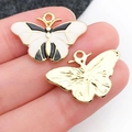 Black and white enamel butterfly charm pendant in gold finish for DIY jewelry - Black and White Enamel Butterfly Wing (19101)