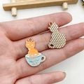 Detailed view of enamel cat charms in blue teacups for DIY jewelry making - Orange Cat Blue Cup