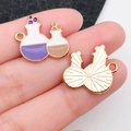 Dual potion bottle charms with purple and khaki enamel in golden alloy setting - Potion Bottle Style (19518) / Purple