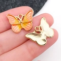 DIY butterfly pendant charms set with orange enamel finish and golden metal relief details - Orange and Yellow Enamel Butterfly Wing (19104)
