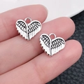 Ciondoli ali di cuore in argento antico per gioielli fai-da-te e collane - Stile Ali di Cuore B (13335)