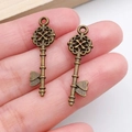 Antique bronze key pendants with ornate hollow patterns for vintage DIY jewelry making - Vintage Embossed Pattern Key (20978) / Antique Bronze