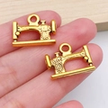 Antique gold sewing machine charm pendants in a miniature metal design for DIY crafts - Exquisite Sewing Machine (20237)