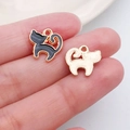 DIY black enamel cat charms in gold alloy, showcasing front and back texture on fingertips - Enamel Black Arched Back Cat (9938)