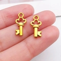 Pair of vintage gold heart-wing key pendants for DIY necklaces and craft jewelry making - Antique Gold Small Key (11368)