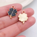 DIY black clover alloy pendant with golden textured back and gold-toned edges - Black Enamel Alloy Four Leaf Clover (11914)