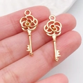 Gold key charms with hollow rose handle for DIY jewelry making and necklace crafts - Flower Hollow Key (18269)