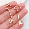 Gepolijste gouden sleutelhangers in een set van twee voor DIY-sieraden - Vintage Sleutel (20991)