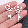 Silver winged heart key pendant for DIY necklaces featuring intricate filigree design - Bright Silver Baroque Scroll Key (20969)