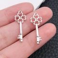 Pair of silver winged heart key pendants for DIY necklaces and couple jewelry - Bright Silver Clover Heart Key (20970)