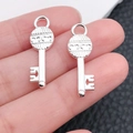 Polished silver wing heart key pendant for DIY jewelry making and necklace charms - Bright Silver Relief Scroll Key (20971)