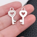 Silver wing heart key pendant DIY jewelry accessory in polished metal finish - Bright Silver Dotted Edge Heart Key (20972)