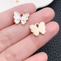 White enamel butterfly pendant in gold plating for DIY jewelry necklaces and bracelets - White Enamel Butterfly (11862)