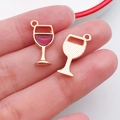 DIY red wine glass alloy charms with dark red enamel finish shown on fingertip - Red Wine Glass (10987)