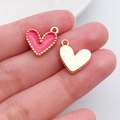 Handgemaakte hartvormige hanger van roze emaille en goud voor sieraden maken - Perzik Hart