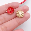 Red enamel and gold daisy flower charms for DIY jewelry making held on fingertips - Daisy Shape (19605)