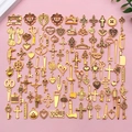 Assorted gold alloy charms including sewing machines, crosses and hearts for DIY jewelry - Antique Gold Mixed (SN1025)