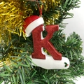 Christmas tree hanging decoration featuring a red glitter letter K with Santa hat - Letter K (Style K)