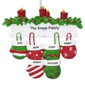 Detailed view of resin Christmas ornament with custom family names and hanging mittens - 6 Mittens Style