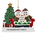 Custom resin Christmas tree ornament with a family of three sitting on a red sofa - 3 Snowmen Design