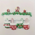 Resin Christmas ornament featuring red candles, holly leaves and four snowflake mittens - Snowflake Mitten Family Style (5598143997276)