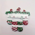 Resin fireplace ornament with red candles and four hanging snowflake gloves - Snowflake Mitten Family Style (5598143997278)