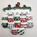 Resin Christmas fireplace ornament with red candles and 9 hanging snowflake mittens - Snowflake Mitten Family Style (5598143997284)