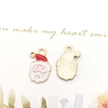 Detail of enamel Santa Claus charm showing red hat, white beard and golden metal back - Santa Claus (8860)