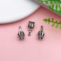 Three antique silver crown pendants for DIY jewelry making on pink background - Antique Silver 3D Crown Style (B290)