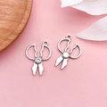 Pair of vintage silver alloy scissors charms for DIY jewelry making on pink background - Vintage Tool Scissors (4850)