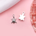 Silver turtle charms for jewelry making with detailed shell pattern on pink background - Sea Turtle (10359)