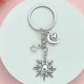 Silver DIY keychain featuring sun moon and star charms on a clean pink background - Antique Silver Star and Moon Style (ER543)