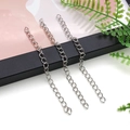 Close-up of three 10cm silver iron curb extender chains for DIY jewelry making - Antique Silver Link Chain (18858)