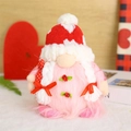 Detail of pink plush gnome with heart knitted hat and white braids for Valentines decor - Round Hat Female Style