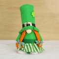 Detail of St. Patrick's Day gnome featuring a green shamrock hat and orange braids - Female Style (With Orange Braids and Sequin Skirt)