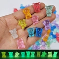 Luminous mini resin bears in multiple colors for DIY crafts shown in glowing dark mode - Luminous Mini Panda