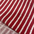 Macro detail of red and white striped knit fabric with fine wool texture for Christmas - Wide Red And Thin White
