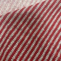 Detailed macro shot of red and grey striped knit fabric with ribbed texture - Red + Light Grey