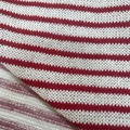 Macro shot of red and white striped knit fabric showing detailed texture and soft weave - Wide White And Thin Red