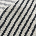 Macro view of black and white striped knit fabric showing detailed fine texture - Wide White And Thin Black