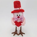 Pink plush bird figurine with a red heart and festive hat for Valentine decoration - Top Hat Bird With Heart
