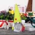 Mother's Day gnome doll with neon green pointed hat and grey beard on festive background - Green