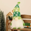 Gnomo di Natale luminoso in peluche con cappello a strisce su panca di legno - Verde