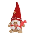 Dettaglio dello gnomo di Natale in peluche con motivo pan di zenzero e cappello lavorato - Gnomo Femmina